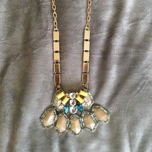 Beautiful geometric statement necklace in gold